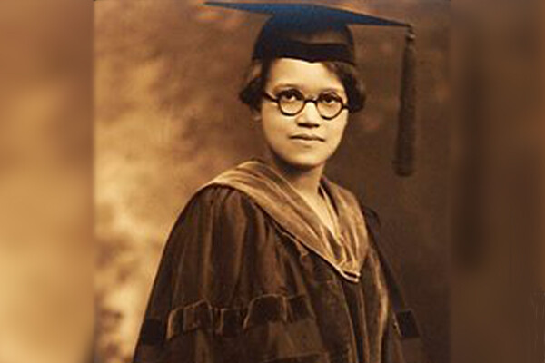 Sadie T.M. Alexander in a graduaction cap and gown.