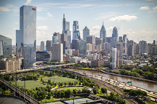 View of Philadelphia skyline with Penn Park in foreground