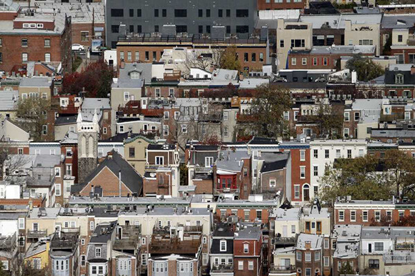 Aerial view of several blocks of rowhouses in Philadelphia.