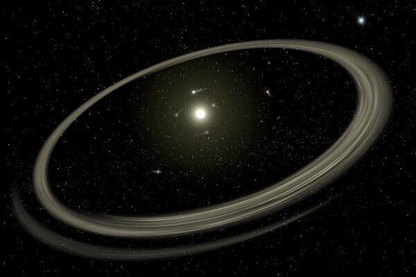 a start in the center of a dark sky surrounded by orbiting planets and a ring of dust