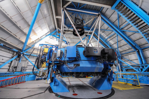 the NEID spectrometer inside of a telescope dome