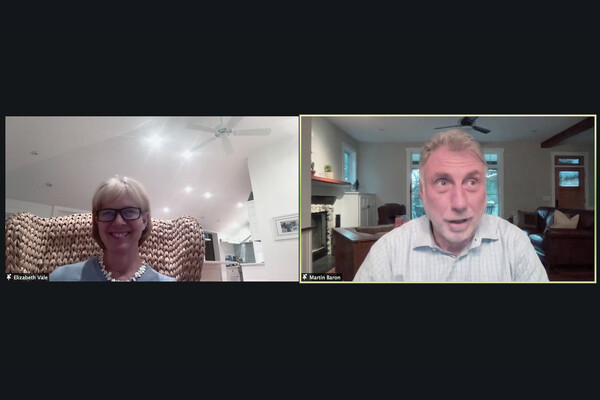 A zoom meeting screen shows Elizabeth Vale on the left screen and former Washington Post executive editor Martin Baron on the right screen.
