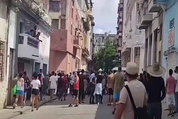People standing on the streets of Havana in protest of the Cuban government.