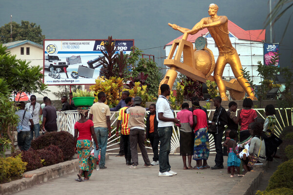 rwanda team in front of monument