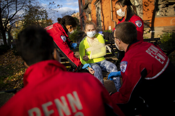 mert students treating person with arm injury