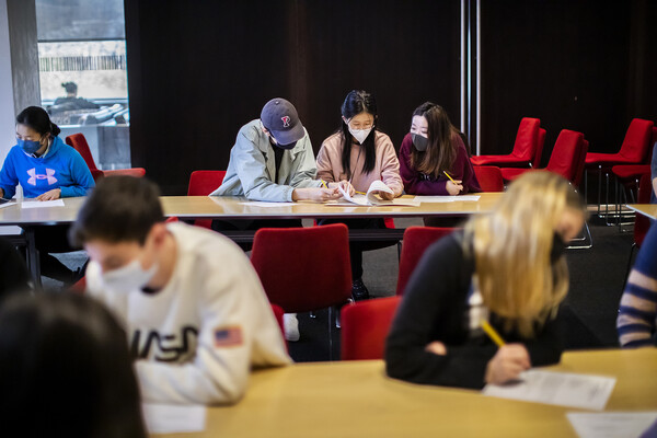 students looking at manuscripts in a penn libraries course