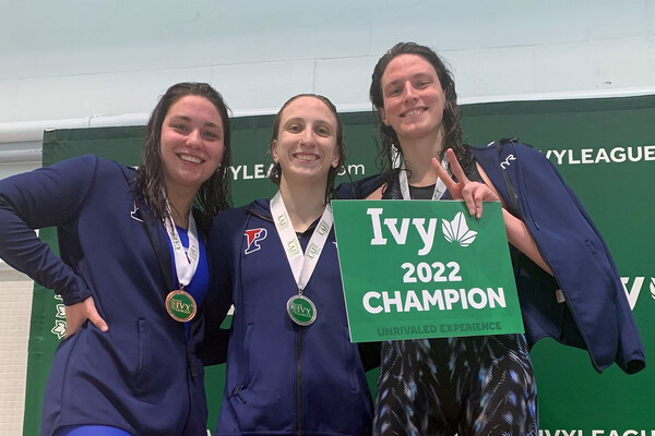 From left, Anna Kalandadze, Catherine Buroker, and Lia Thomas pose with their Ivy League Championship medals.