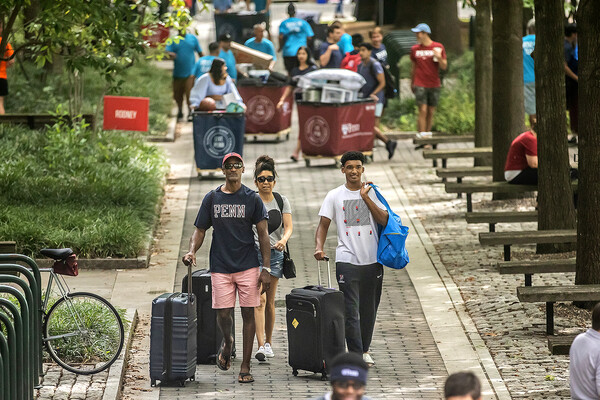 penn family moves into quad with suitcases