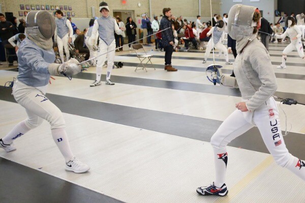 At the Tse Center, two fencers face off during a bout.