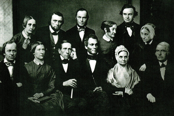 Robert Purvis, center, surrounded by others in a historical photo from 1851.