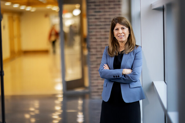 Esra Sahingur in the halls of the dental school