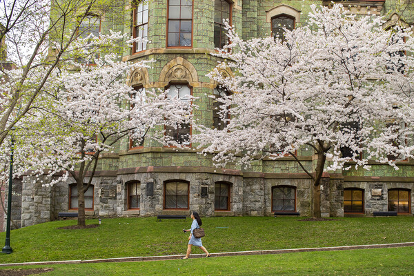 Pereson walking on Penn campus