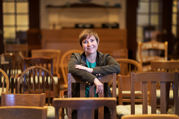 Jamie-Lee Josselyn sitting in a room full of chairs