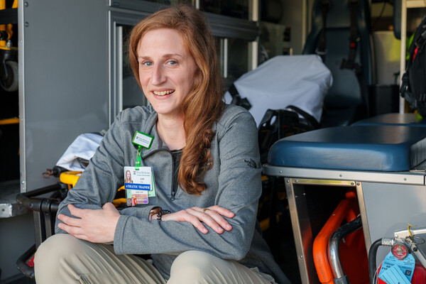 Ann Seaton seated in the back of an ambulance.