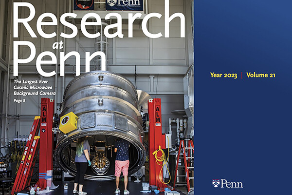 The cover of Research at Penn shows two researchers working inside the largest ever cosmic microwave background camera.