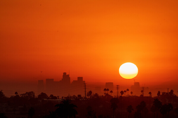 A sunset over Los Angeles in a heat advisory.