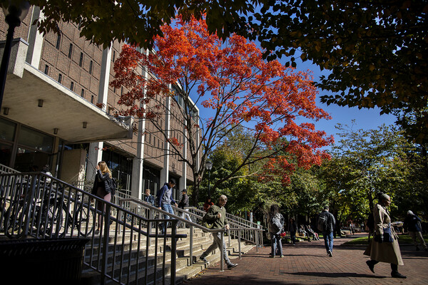 Students walk over steps to Van Pelt-Dietrich Library. 