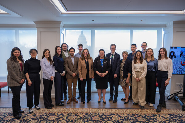 Students from Penn and Eugenie Birch stand with members of the US Department of State and the Ukrainian Ambassador.