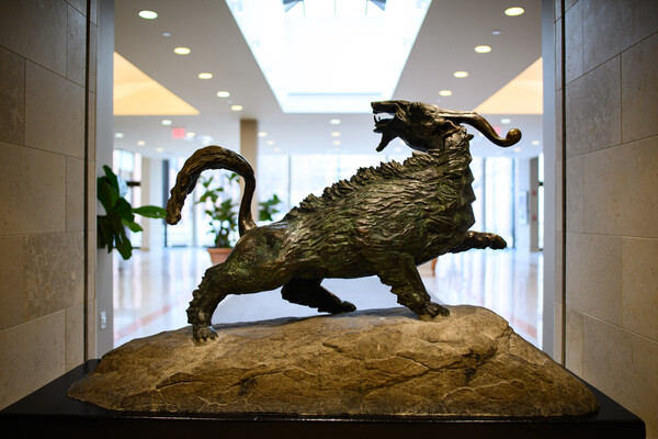 Bronze statue of a goat is displayed in the lobby of Penn Carey Law School.