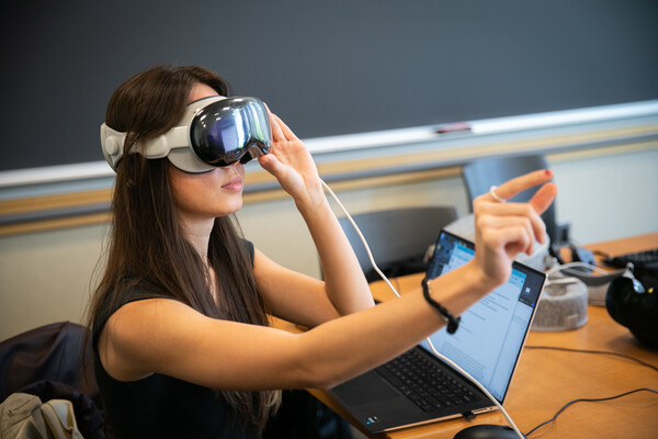 Lorraine Ruppert wears virtual reality headset.