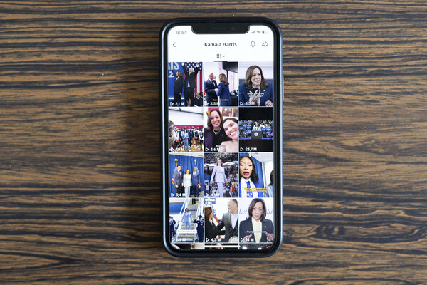 A smartphone open to the Kamala Harris TikTok page.