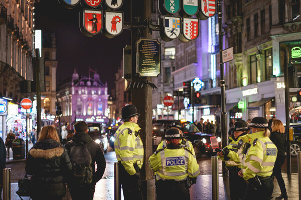 Police officers patrolling Leicester Square and Piccadilly Circus in central London