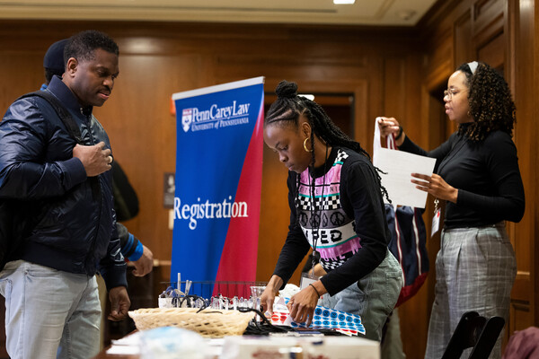 Students at the registration table for the Responsible Computing Challenge.