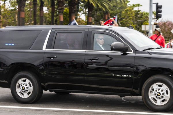 Donald Trump in a car driven by Secret Service.