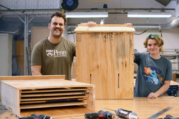 Nick Tanner and Daniel Flinchbaugh with a finished bat box.