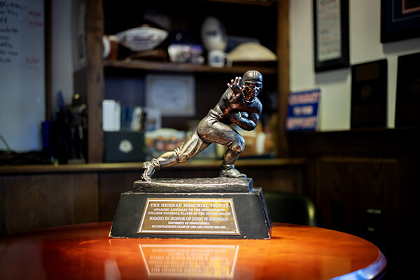 The Heisman Trophy in the office of football coach Ray Priore.