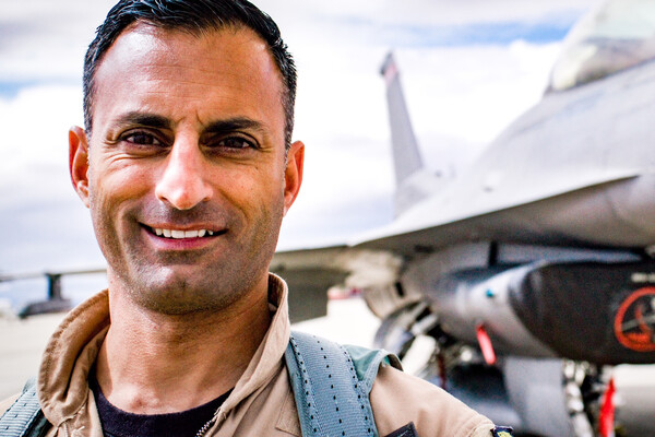 Jameel Janjua in front of an F-16.