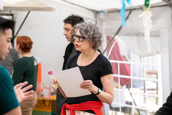 Lisa Servon talks with students in her practicum course.