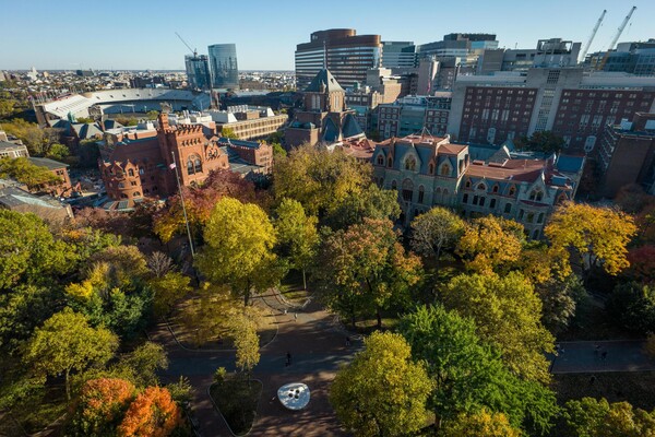 Campus overhead view featuring foliage and various campus buildings