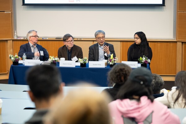 Four people on panel.