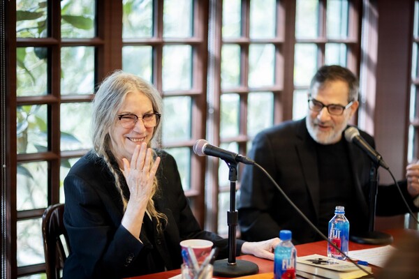 Patti Smith and Al Filreis at microphones. 