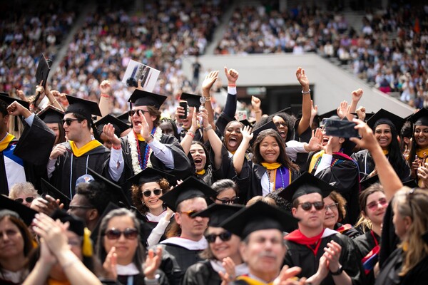 Graduates cheering at Penn’s 269th Commencement.