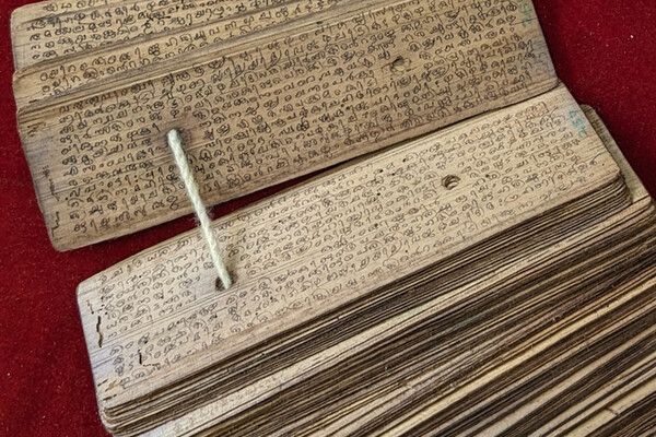 Medieval mathematical manuscript written in vernacular Malayalam script on palm-leaf