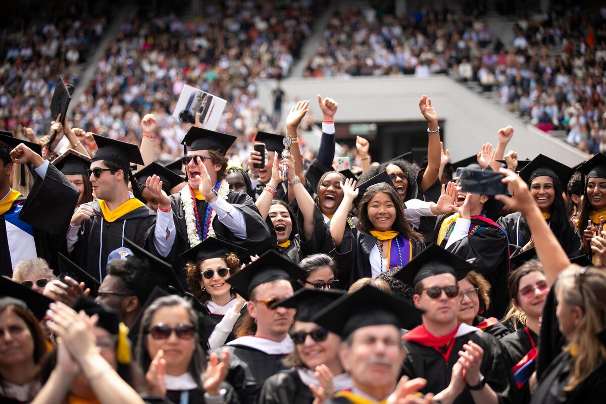 Graduates cheering at Penn’s 269th Commencement.