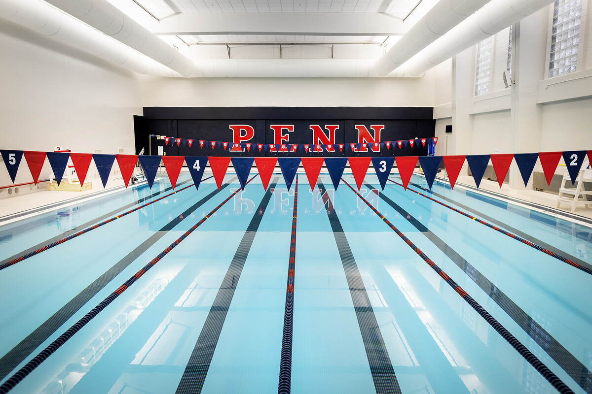 Red and Blue ribbons run across a renovated Sheerr Pool.