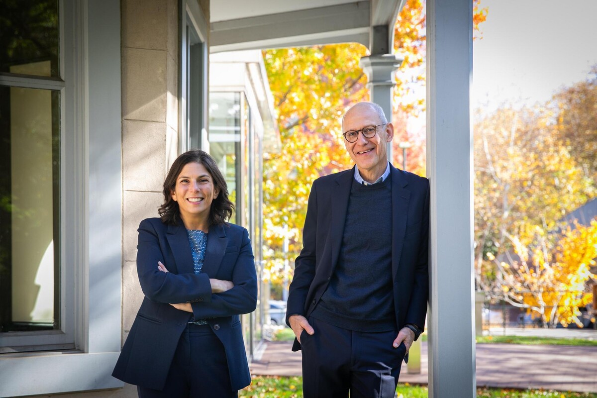 Megan Ryerson and Zeke Emanuel together next to Perry World House. 